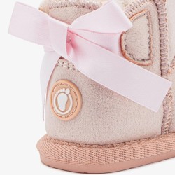 Bota australiana Tecnobaby respetuosa lazo en rosa