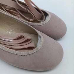 bailarina lazo en piel ante rosa